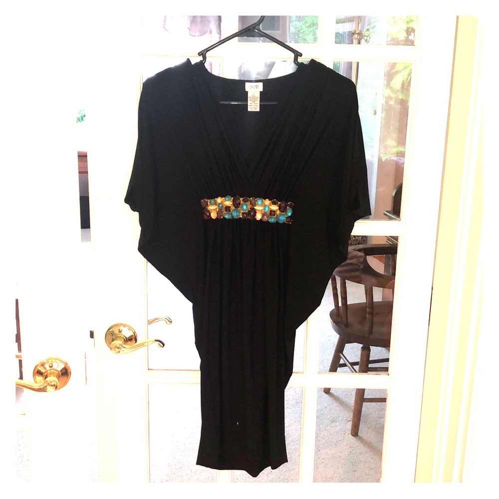 Black cache evening dress.